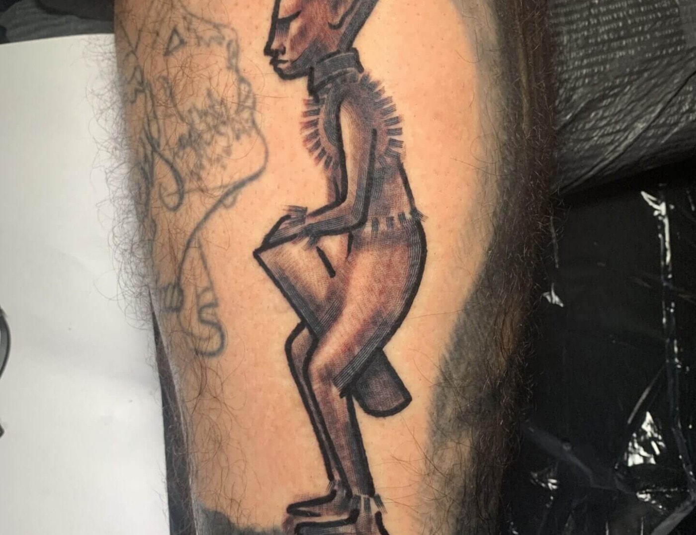 Graffro traditional figurative art by Wheres Wally at Iron Palm Tattoos in Atlanta, Georgia. Walk-Ins are accepted. Call 404-973-7828 or stop by for a free consultation.