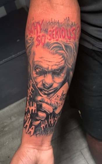 'Why So Serious?' tattoo featuring a portrait of Heath Ledger as Joker by J.R. Outlaw at Iron Palm Tattoos & Body Piercing in Atlanta, GA. Call 404-973-7828 or stop by for a free consultation.