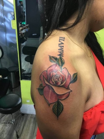 Floral Tattoo By Mo8 With Bold lines And Color At Iron Palm Tattoos & Body Piercing. Call 404-973-7828 or stop by for a free consultation with Mo8. Walk Ins are welcome.