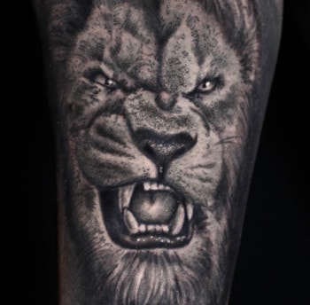 Lion photo realistic animal tattoo in black & grey by DB. Wyte in downtown Atlanta's Castleberry Hill art district. Call 404-973-7828 or stop by for a free consultation.