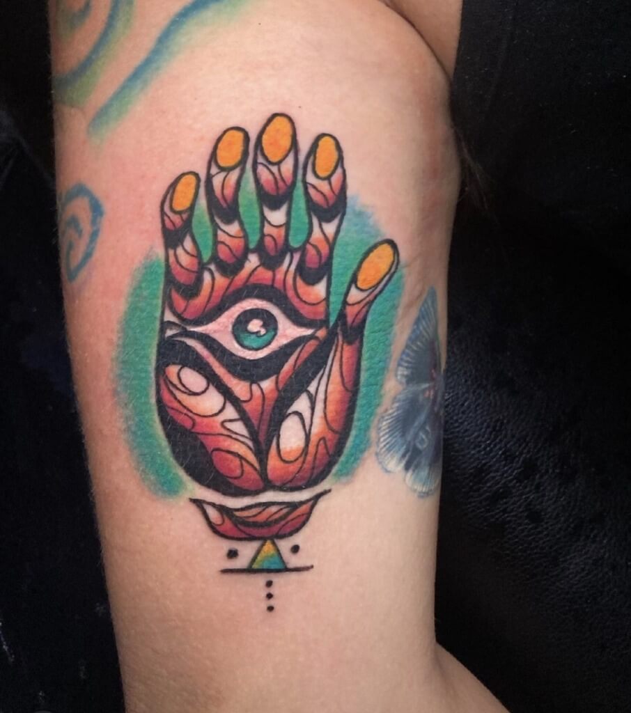 Hamsa Tribal Tattoo By Funk Tha World At Iron Palm Tattoos In Atlanta Georgia. Hamsa Tattoos symbolize the 'Hand of God' in multiple religions but also symbolize fertility as well. Call 404-973-7828 or stop by for a free consultation with Funk. Walk Ins are welcome.