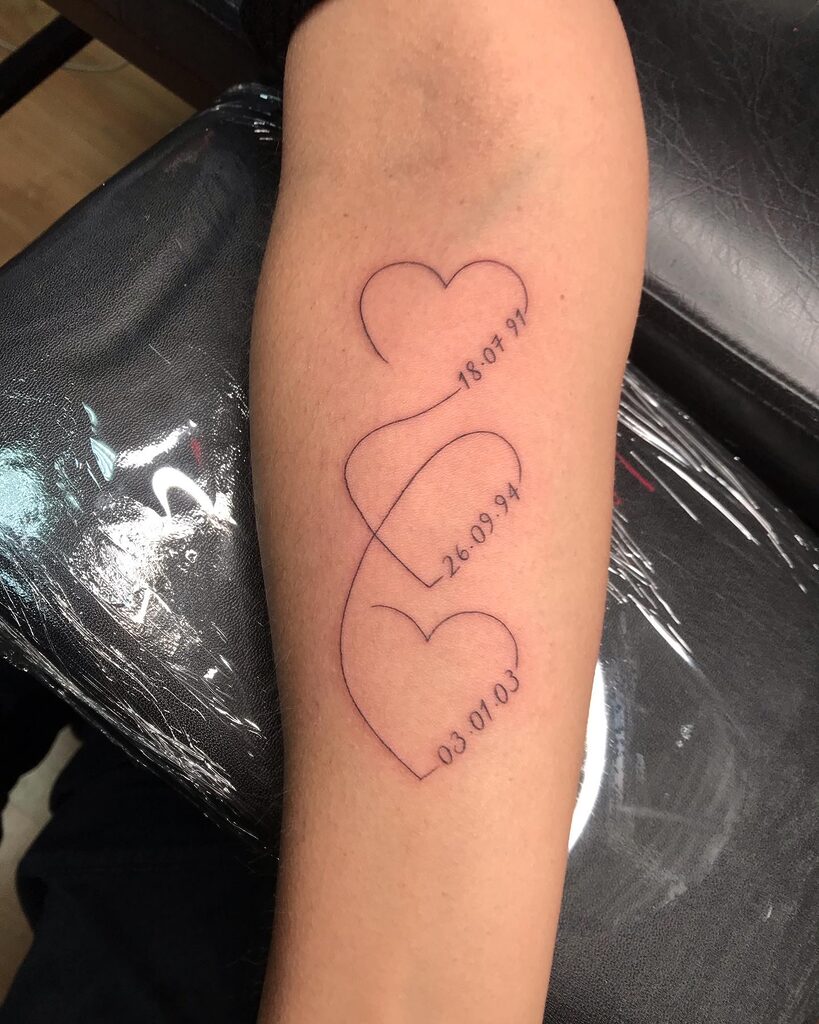 Fine Line Hearts With Important Dates Symbolism Tattoo By Rene Cristobal, a guest artist at Iron Palm Tattoos in Atlanta. Not all tattoos are about the visual arts. Some are just important personal symbols. Rene inked these hearts with important dates for a client that would to memorialize those important days. Rene comes to us from Vision Tattoo Studio in Concepcion, Chile. He is available for booking on September 11th, 2023. We're open until 2AM most nights. Call 404-973-7828 or stop by for a free consultation. Walk-Ins are welcome.