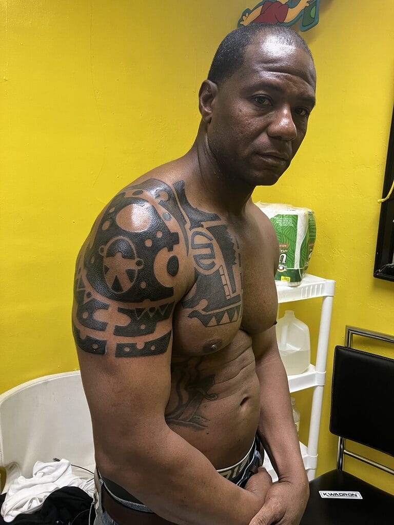 Nigerian Warrior Tribal Blackwork Tattoo By Binky Warbucks - Iron Palm  Tattoos \u0026 Body Piercing, image size:768x1024