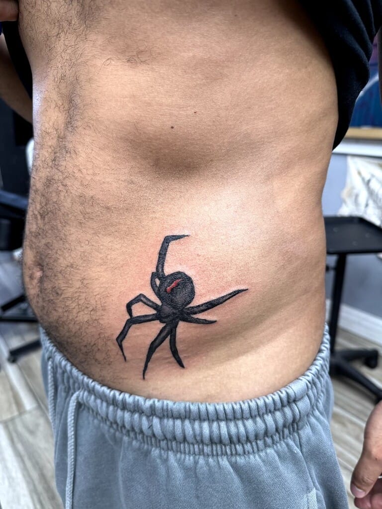 blackwork black widow spider tattoo side